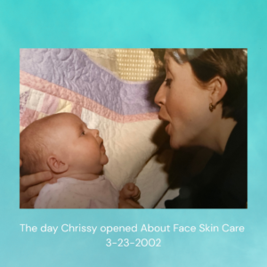 Chrissy, owner of About Face Skin Care, holding her newborn the day she opened her medical spa in 2002 in Georgia